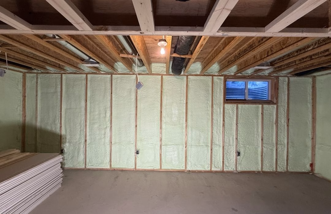 Finished spray foam insulation in a basement in Kawartha Lakes.
