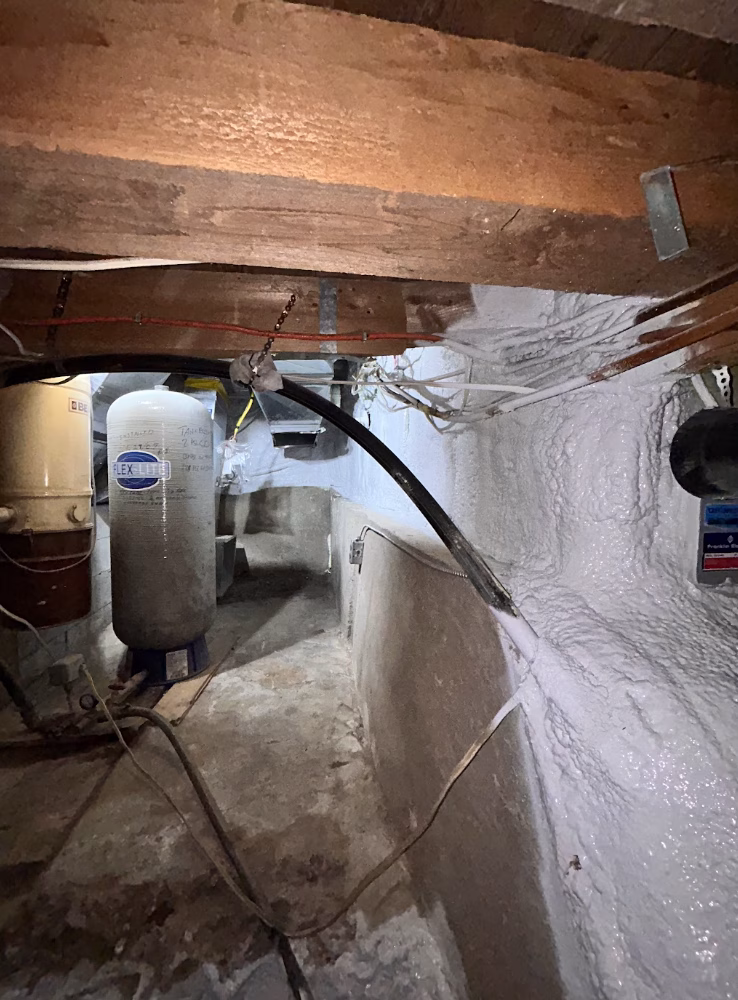 Spray foam insulation was applied to this crawlspace in a Peterborough home.